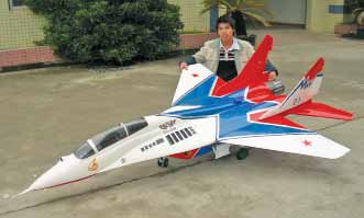 A programmable, radio-controlled model aircraft