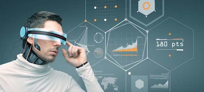 people, technology, future and progress - man with futuristic 3d glasses and microchip implant or sensors over gray background with virtual charts