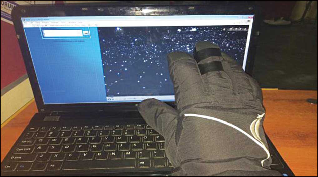Fig. 1: Sixth-sense media player being operated using a hand glove