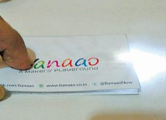 Author prototype of the business card flashlight