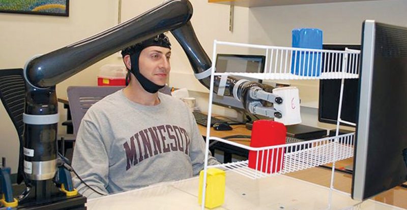 Research subjects at University of Minnesota fitted with a specialised non-invasive brain cap were able to move the robotic arm just by imagining moving their own arms (Image courtesy: University of Minnesota)