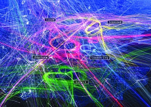 Stacked planes waiting to land at Heathrow Airport represented by the circular flight paths in red (Image courtesy: http://airnation.net)