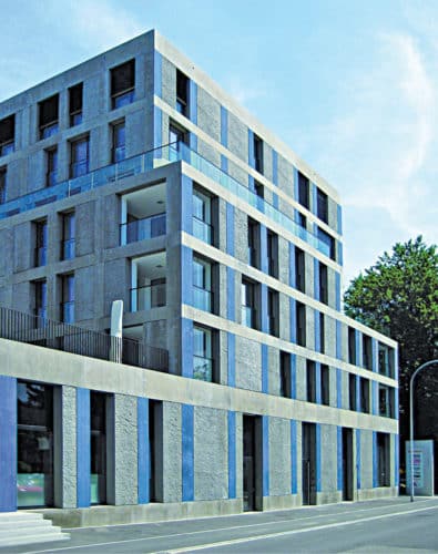 Thin organic solar-cell panels can be integrated into cement and metal portions, not just glass, of a building facade (Courtesy: Heliatek)