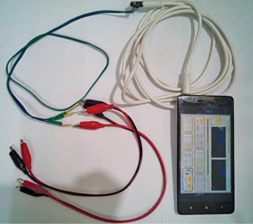 Function Generator app installed on Android smartphone along with crocodile cables 