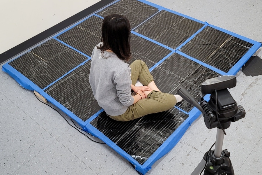 An Intelligent Carpet To Track Human Poses