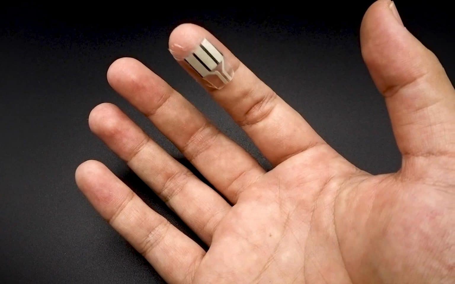 A Tiny Wearable Device can Turn Sweat on Fingertips into Electricity