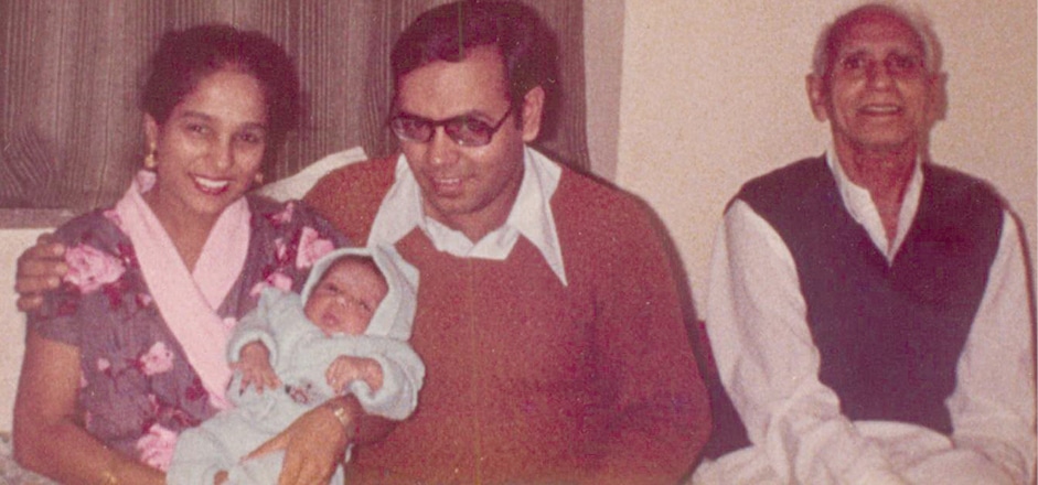 Amrit with his father Narayan Das, wife Varsha, and first born son Akshay
