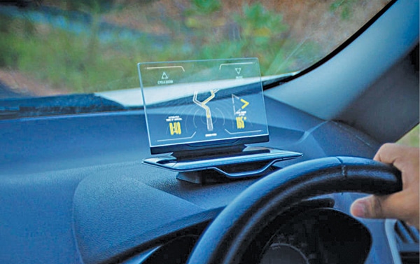 A head-up display (HUD) is any transparent display that presents data (Credit: GoMechanic) 