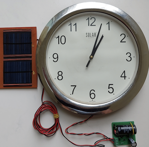 Photograph of system showing PV panels and clock interconnections