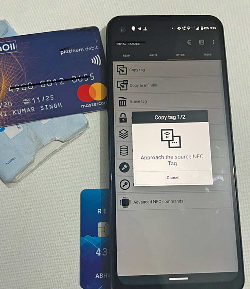 Author testing the NFC cloning of card using phone and NFC tool