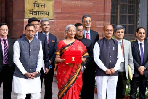 The Union Minister for Finance and Corporate Affairs, Nirmala Sitharaman, on way to Rashtrapati Bhavan and Parliament House, along with the Ministers of State for Finance, Pankaj Chaowdhary and Dr Bhagwat Kishanrao Karad, and some senior officials to present the Union Budget 2023-24