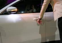 Connectivity Versus Security: Design Engineers’ Dilemma Asian businessman is unlocking car by using smart watch application