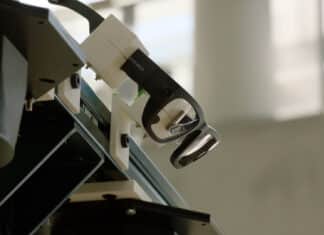 Aria glasses mounted to the top of the robot provide the system with sensor data that allows the robot to perceive and interact with the space