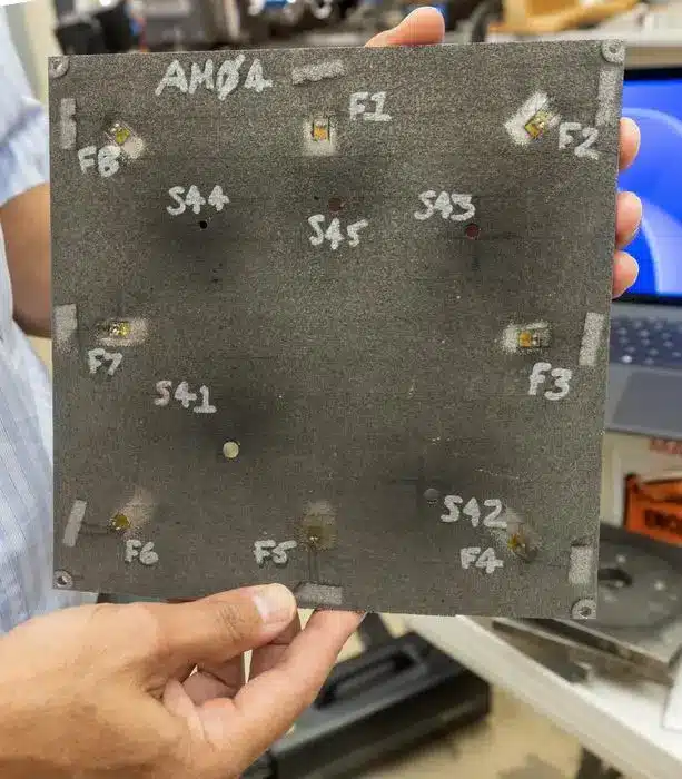 Southwest Research Institute tested its micrometeoroid and orbital debris detection system by striking a sensor-equipped spacecraft panel with debris fired from a light gas gun to simulate orbital impacts