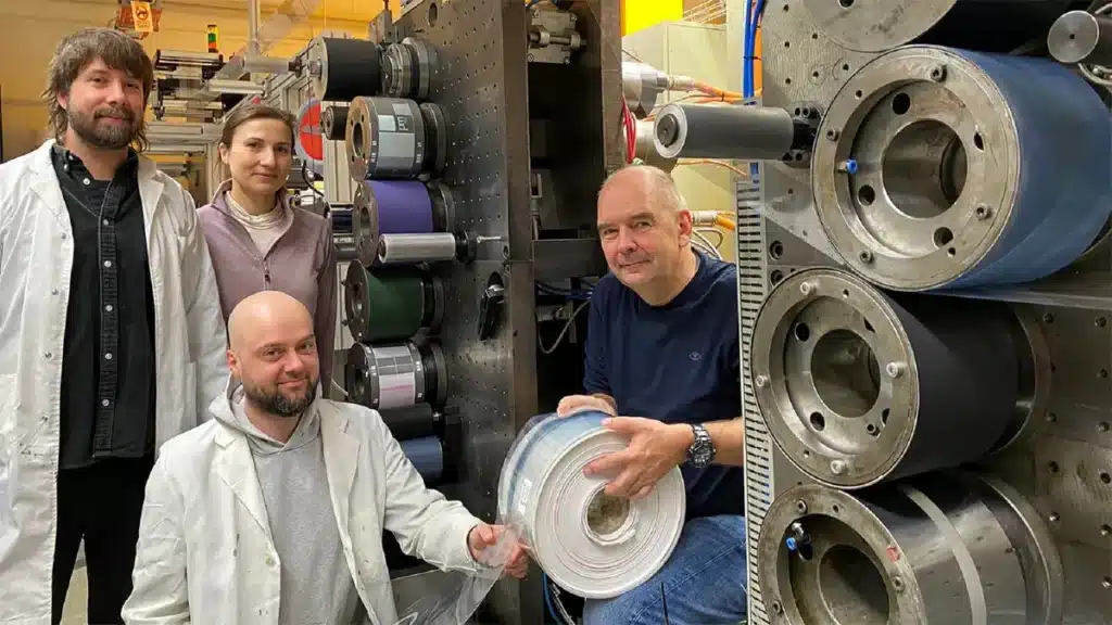 Researchers at Chemnitz University of Technology test-print a conductive PEDOT:PSS layer for organic solar cells using a roll-to-roll press.