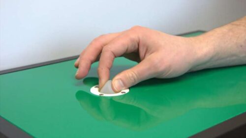 The test rig: Pinching a soft surface, such as a silicone dome, prompts a haptic response. Credit: University of Bath