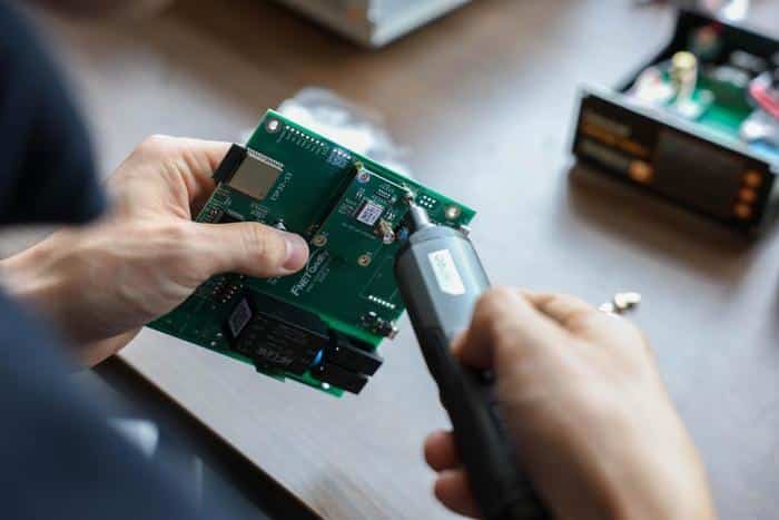 The compact GridEdge Analyzer developed by the University of Tennessee and ORNL can be embedded into power electronics or even plugged into a wall outlet to measure the smallest changes in electrical voltage and current.