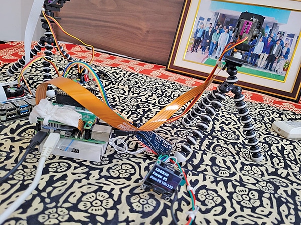 Real-Time Face Tracking Using Raspberry Pi 4 Versus Raspberry Pi 5 With Hailo-8L