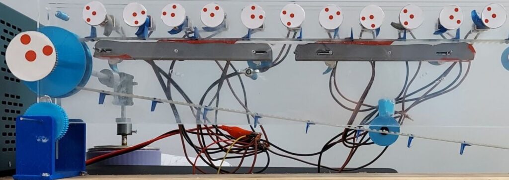 The Bristol team built a simplified system where motors interact through brief contact within a designed structure