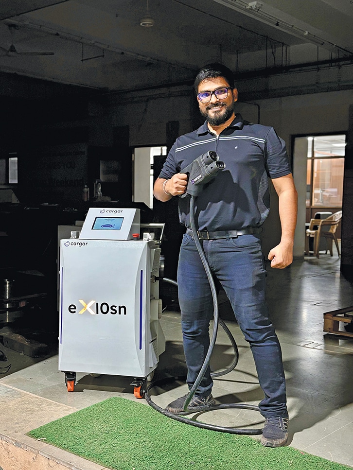 Raj Anupam, Co-founder, MCS Cargar with India’s first portable flexible DC fast charger