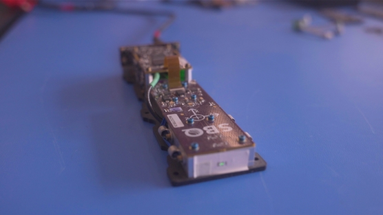 SBQuantum’s quantum sensor hardware. The device, roughly the size of a quart of milk, launched aboard a SpaceX Falcon 9 for the NGA’s MagQuest Challenge