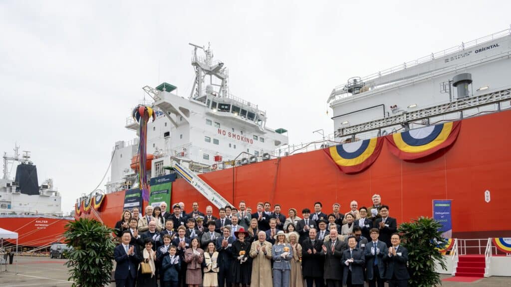 Attendees pose during a naming ceremony for medium-sized gas carriers at HD Hyundai Heavy Industries in Ulsan.