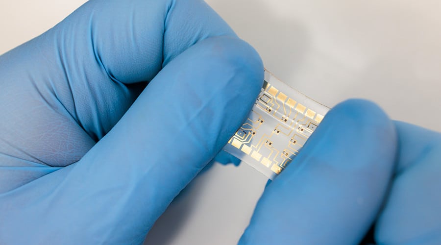 The new device, designed and tested in collaboration with researchers at Argonne National Laboratory, was made possible by the development of manufacturing processes that allow organic electrochemical transistors to be printed onto flexible surfaces. (Photo by John Zich)