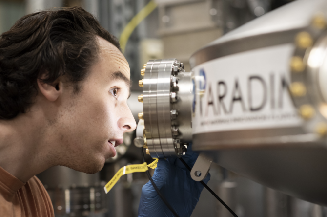Matthew Barone, Ph.D. ’22, utilizing the molecular-beam epitaxy system to grow the thin films at Cornell’s Platform for the Accelerated Realization, Analysis, and Discovery of Interface Materials.