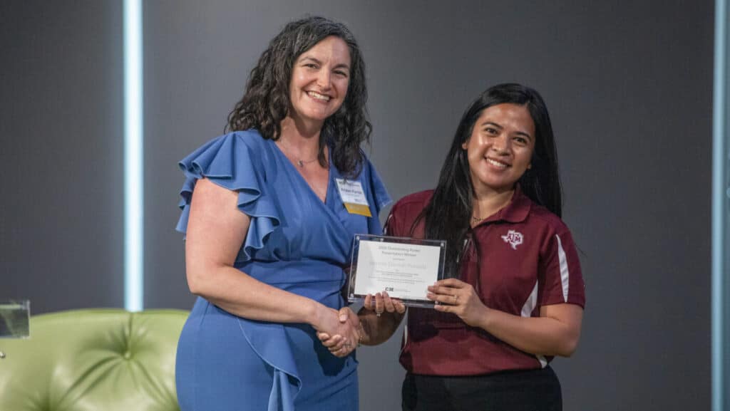Jaybelle Pranada holding her award at the C3E Symposium.

Credit: Courtesy of Quinton Kendall.
