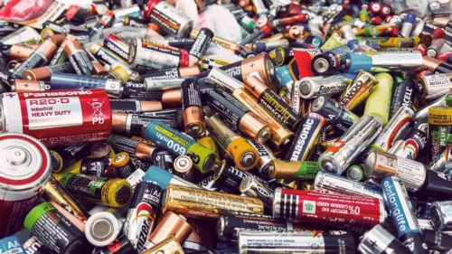 A large pile of discarded batteries.