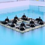 Self-Assembling Water Robots Reshape Future Floating Infrastructure Systems