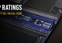 Why IP Ratings Do Not Tell the Full Foldable Story Close-up of glowing dust particles inside a foldable phone's hinge mechanism, titled IP Ratings Don't Tell the Full Story