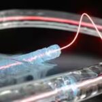 Frozen Fibre Strengthens Light-Sound Coupling