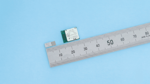 KAGA FEI ES4L15MA1 Bluetooth module and EC4L15MA1 shown next to a ruler for scale