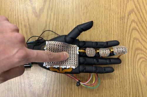 A robotic hand fitted with 3D-printed sensor module developed by the research team from Washington State University. The electronic skin can detect pressure and temperature at a fine level, laying the groundwork for bionic skin that could be used on prosthetics to help amputees and others.
