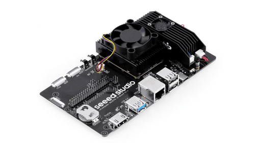 Close-up of the RK3576 module's cooling fan, heatsink and connector ports on the I/O carrier board