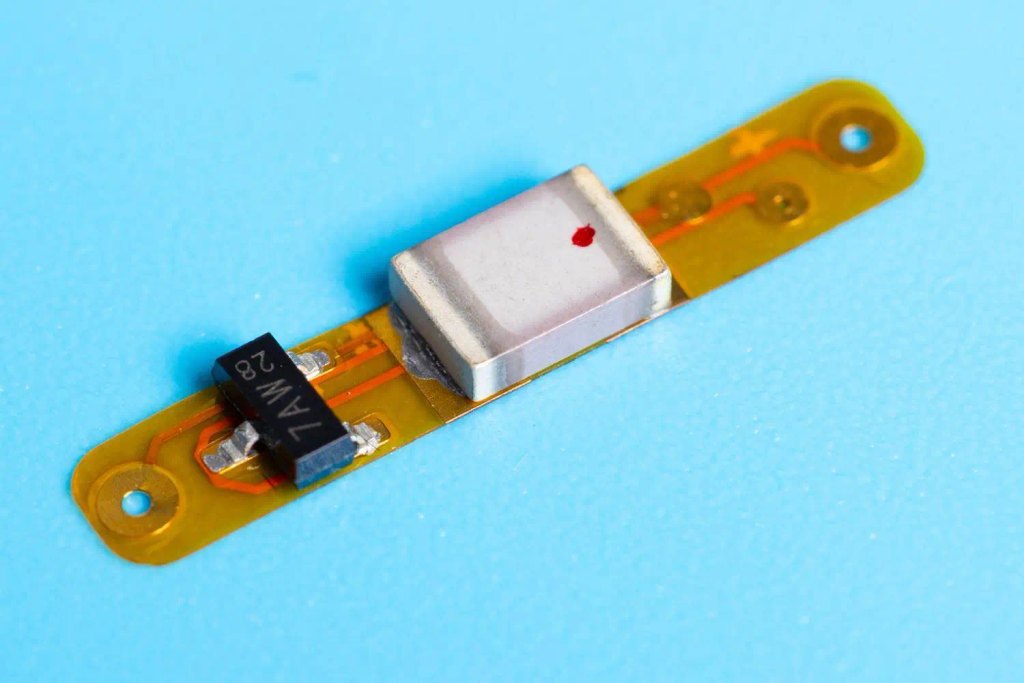 A small implant that’s able to communicate and coordinate wirelessly with external wearables and sensors.