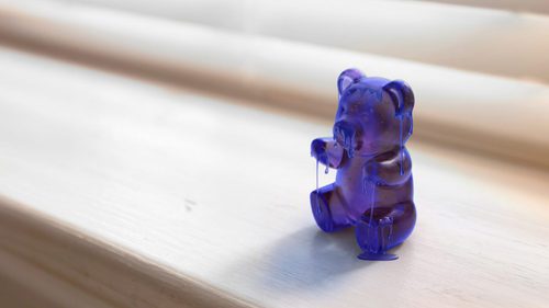 A gummy bear-shaped salogel, designed by Dr. Peiran Wei, symbolizes a new class of polymer-salt hydrate hybrid materials developed by researchers in the Texas A&M University Department of Materials Science and Engineering.(Image Credit: Soft Matter Facility at Texas A&M University)