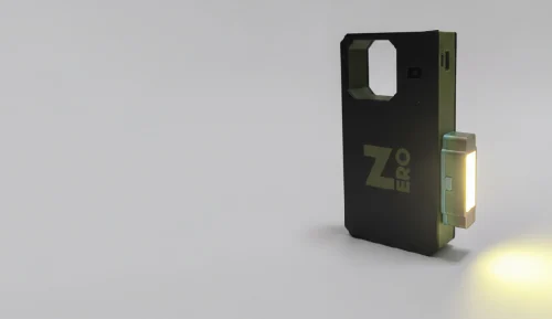 The ZERO power bank with a magnetic flashlight accessory attached to its side, lit and standing upright